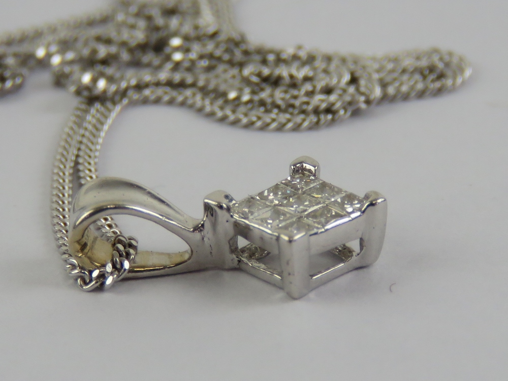 An 18ct white gold and diamond pendant on a 9ct white gold fine chain necklace, - Image 2 of 3