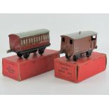 A Hornby 0 gauge number one passenger coach together with a goods brake van, in original boxes.