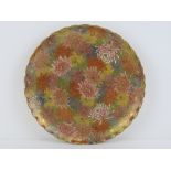 A Japanese Satsuma hand painted plate,