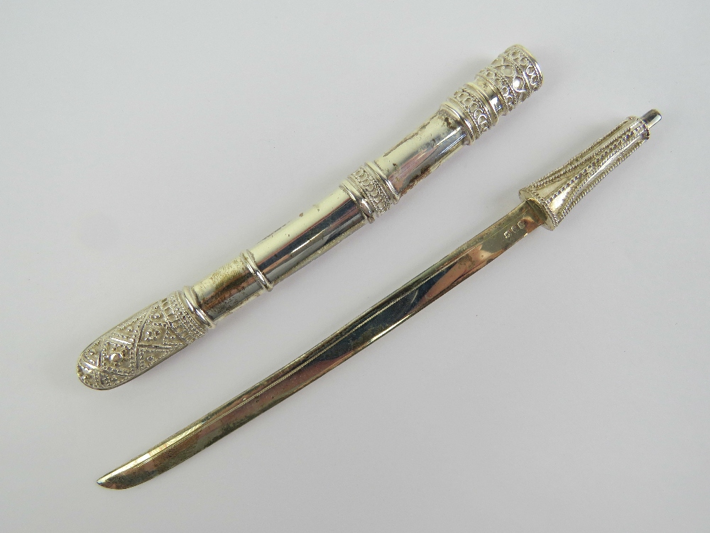 A miniature Osmani ceremonial sword having sterling silver blade, marked 925 with Arabic hallmarks,