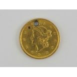 An 1852 United States of America 'Liberty Head' 21.6ct gold (0.900) 1852 $1 coin, 1.6g.