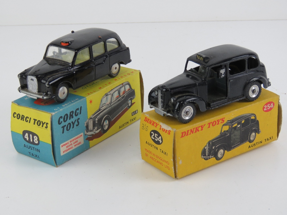 A Dinky Toys Austin Taxi No254, together with a Cogri Toys Taxi No418. Two items in original boxes.
