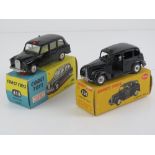 A Dinky Toys Austin Taxi No254, together with a Cogri Toys Taxi No418. Two items in original boxes.