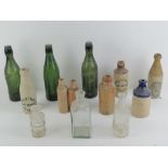 A quantity of vintage stoneware and glass beer bottles etc, includes Manning & Co Northampton,