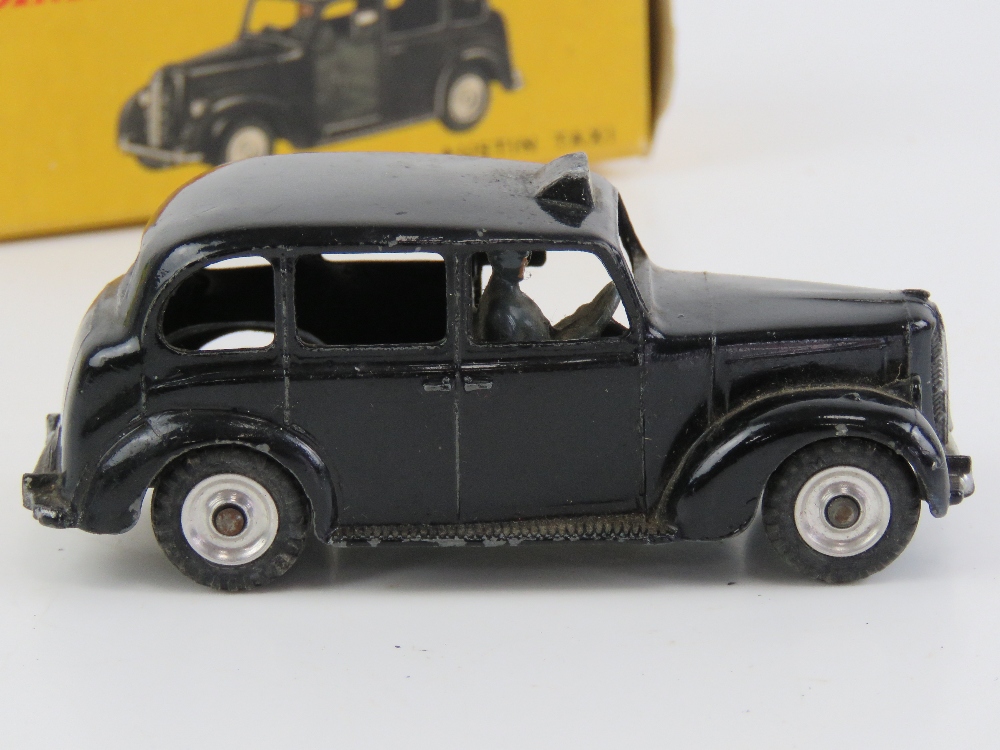 A Dinky Toys Austin Taxi No254, together with a Cogri Toys Taxi No418. Two items in original boxes. - Image 6 of 9