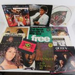 A quantity of assorted records including; Michael Jackson, Janet Jackson, Vanilla Ice,