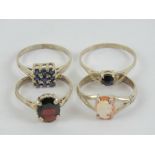 Four HM silver rings; solitaire sapphire size O-P, sapphires in square setting size M-N,