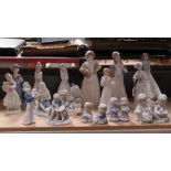 Three assorted Lladro figurines, 15-25cm high, fingers a/f.