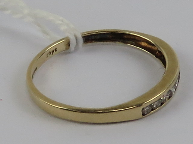 A 9ct gold and diamond half eternity ring, total 0.25ct of diamond, size P-Q, 1.2g. - Image 2 of 2