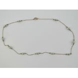 A vintage 9ct gold and grey pearl bead necklace, stamped 9ct, 42.5cm in length, 3g.