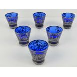 A set of six Venetian silver overlaid blue glass tot cups.