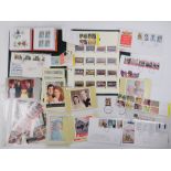 A quantity of assorted collectors stamps, first day covers, postcard stamps, etc.