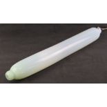 A 19th century milk glass oversized 'rolling pin', 75cm in length.