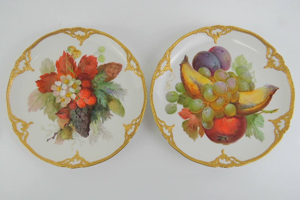 A fine pair of handpainted and gilded cabinet plates marked KPM verso,