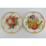 A fine pair of handpainted and gilded cabinet plates marked KPM verso,