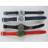 Four vintage Swatch watches.
