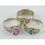 Three silver rings; turquoise size L, amethyst size M, and citrine size L.
