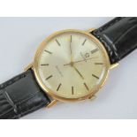 A vintage 9ct gold Omega wristwatch having silvered dial with yellow metal hands, hallmarked 375,
