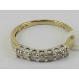 A 9ct gold and diamond half eternity ring, total 0.
