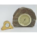 A miniature brass mantle clock having Equinox quartz movement, 5cm wide.