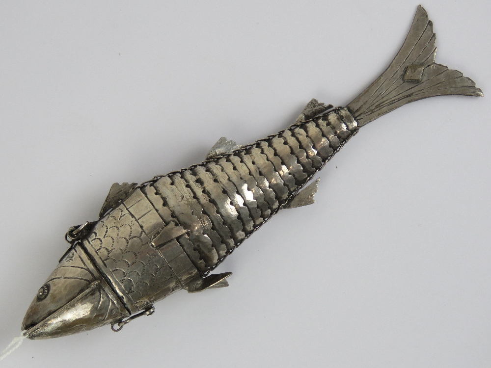 An Indian white metal articulated fish a