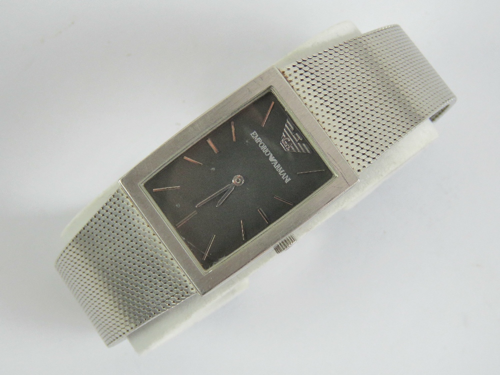 An Emporio Armani gentleman's stainless steel dress watch having black-ground square shaped dial