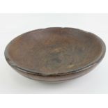 A 19th century Oak pole-lathe turned bowl, 13 1/2" (34.3 cm) diameter.