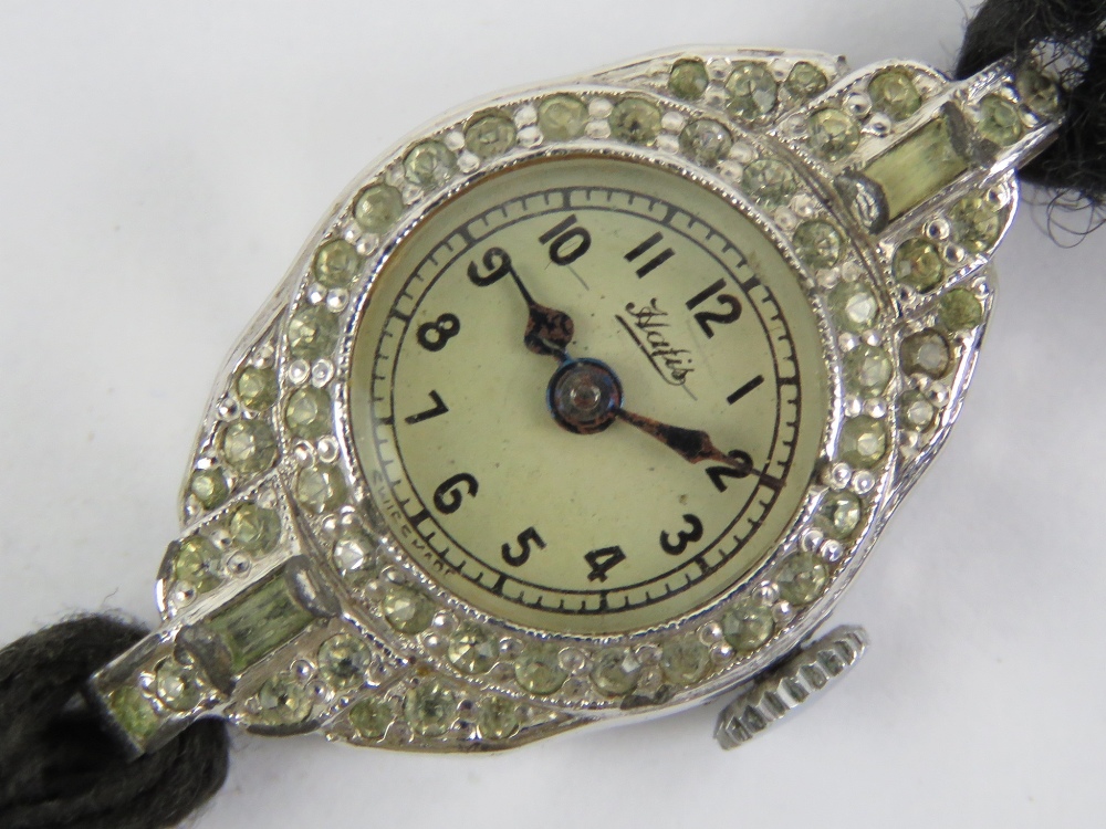 A vintage French cocktail watch encrusted with white stones and engraved Nell 1941, strap a/f. - Image 2 of 5