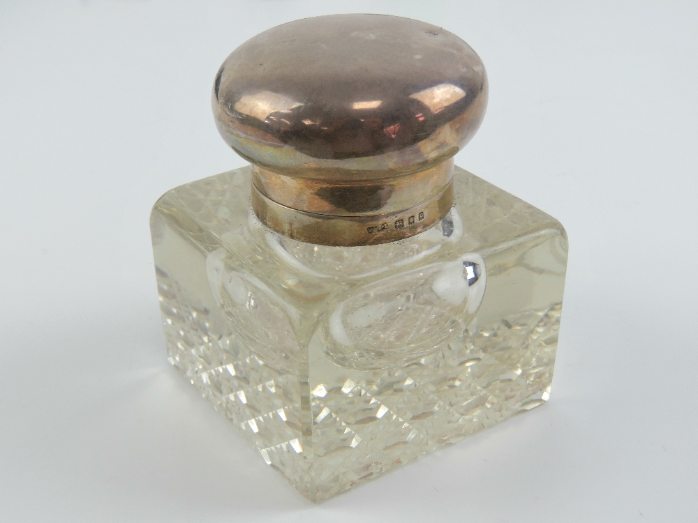 A HM silver and cut glass inkwell, 8cm sq, hallmarked London 1930.