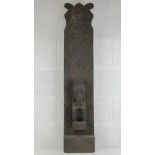 African Wall Art; a part carved and shaped wall piece having geometric design and figure upon,