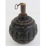 An inert WWI German Kugel grenade with fuse.