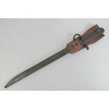 A WWII Japanese Arisaka bayonet, 39.5cm blade, with scabbard and leather frog.