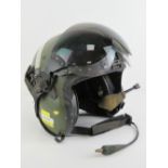 A Pilots helmet with microphone, ear pieces, liner, clear and dark lenses and connector.