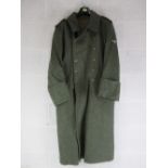 A reproduction WWII German Great Coat.