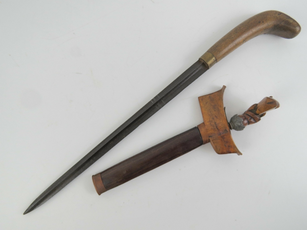 A cruciform dagger measuring 29.