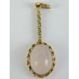 To match above Lot; A 9ct gold rose quartz pendant measuring 4.