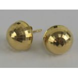 A pair of 14ct gold earrings in the form of semi-hemispherical disco balls, each stamped 14k.