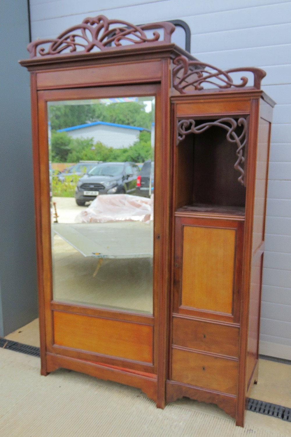 French Art Nouveau: a mahogany wardrobe (in the armoire style) with single bevelled plate glass
