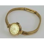 A vintage 9ct gold Girard Perregaux ladies cocktail watch on 9ct gold bracelet strap,