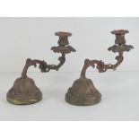 A good pair of solid cast brass cantilever candlesticks of foliate form, each standing 15cm high.