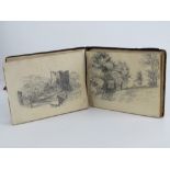 A small book containing a quantity of delightful amateur sketches of rural scenes, churches, houses,