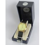 A Sekonda wristwatch in box with instruction guide.