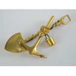 A Victorian 15ct gold 'Grand Tour' South African souvenir brooch in the form of shovel,