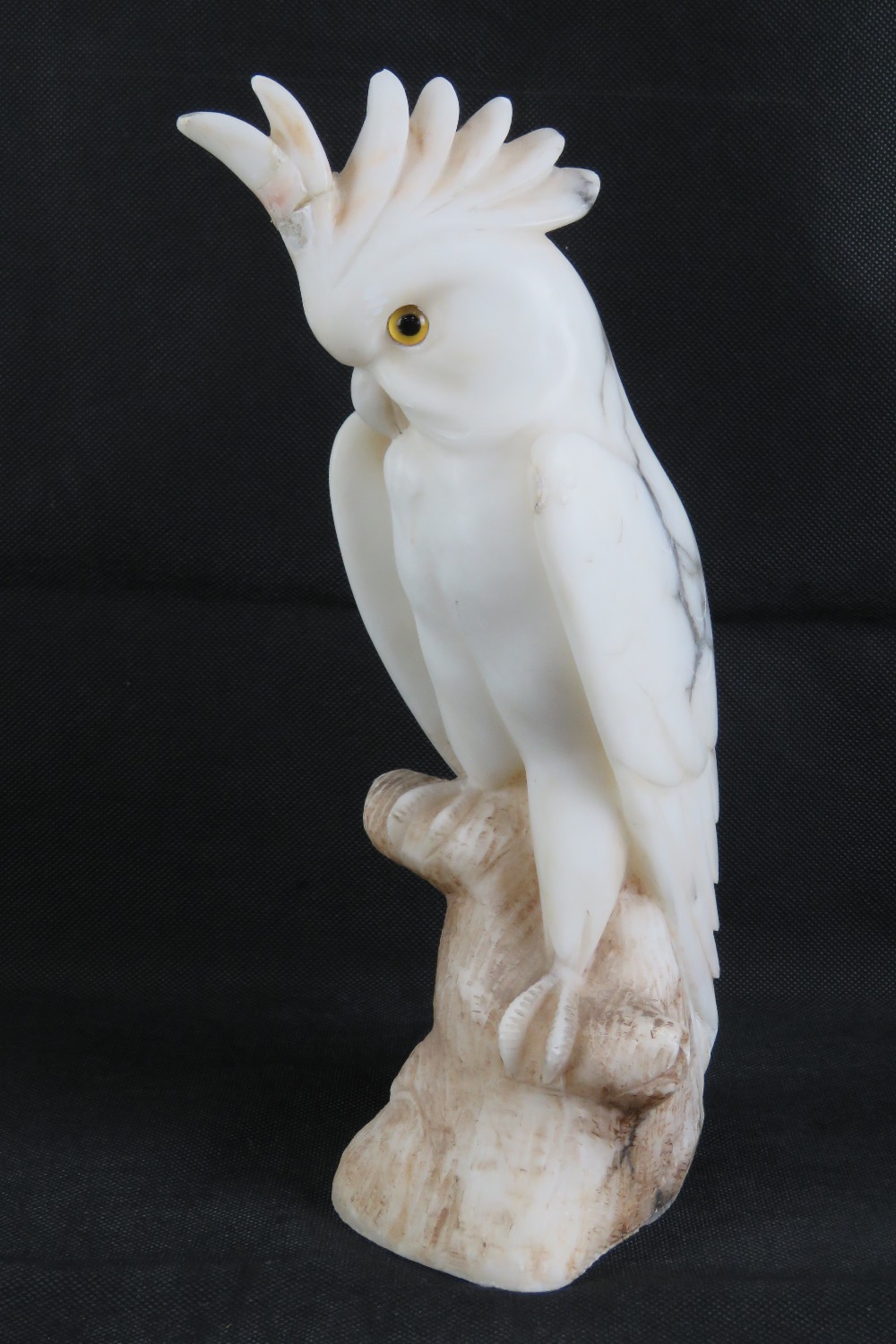 A 19th century carved alabaster cockateal a/f to crest, with glass eyes, 33cm high. - Image 2 of 4