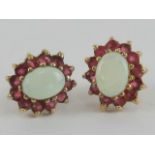 A pair of 9ct gold opal and ruby stud earrings,