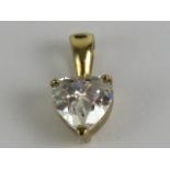 A 9ct gold white stone pendant in the form of a heart, stamped 375, 12mm in length, 0.8g.