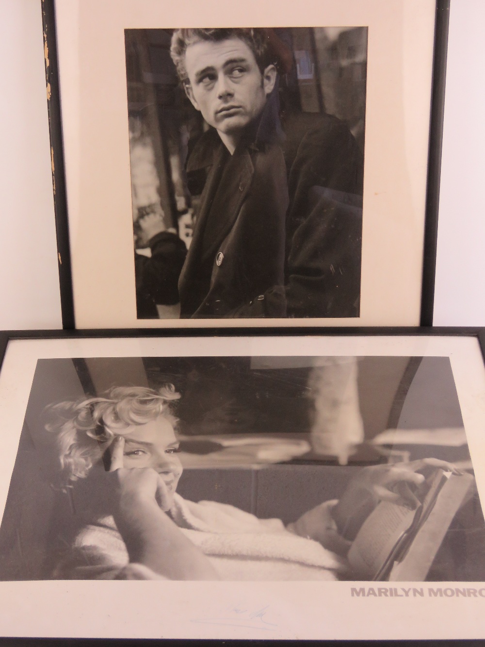 A pair of framed black and white photographic prints being Marilyn Monroe 59 x 79cm and James Dean