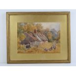 Watercolour; children at play beside a ruined thatched cottage, signed lower left Noakes 1874,