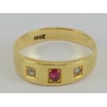 An 18ct gold ruby and diamond gypsy ring,