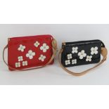 Two handbags having daisies upon. Red bag 24cm wide, black bag 21cm wide.